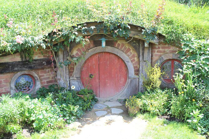 Hobbiton and Waitomo Caves from Auckland - Smaller Group - Hobbiton Movie Set: guided walking, Green Dragon drink, and Marquee buffet